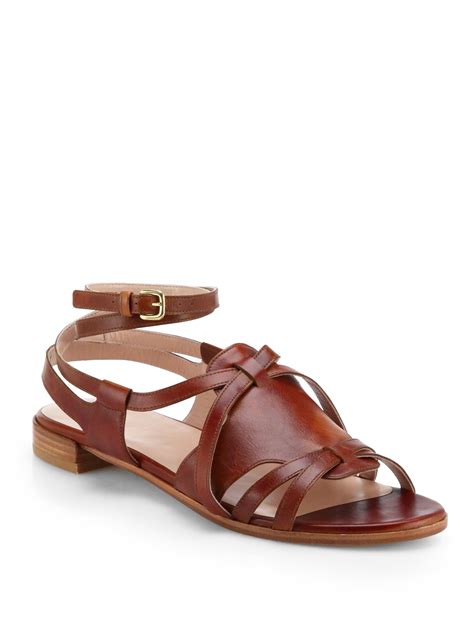 Lyst Stuart Weitzman Greek Leather Strappy Sandals In Brown