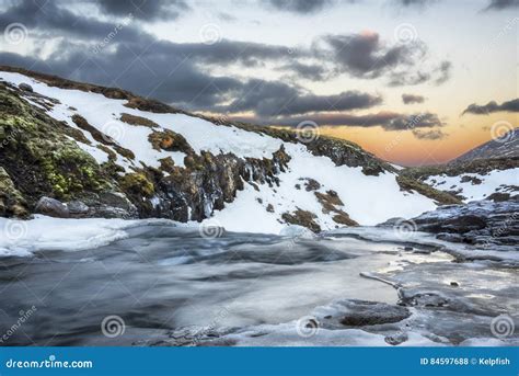 An Icy River At Sunrise In Iceland Stock Photo Image Of Rocky Clouds