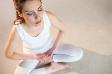 Premium Photo Overhead View Of Woman In Yoga Pose With Eyes Closed