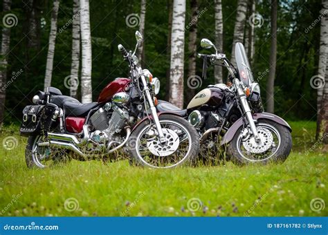 Two Motorcycle Parking On Green Grass On Countryside Editorial