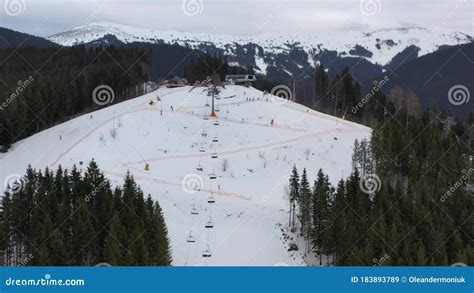 Top View From Drone Ski Lift For Transportation Skiers And Snowboarders On Snowy Slope Ski Lift