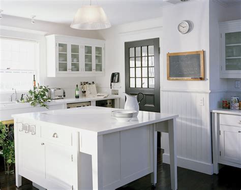 Beadboard kitchen cabinet doors that can be painted can be built with an mdf center panel or you can get them with a solid wood beadboard panel. Beadboard Kitchen - Cottage - kitchen - Sawyer Berson