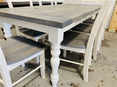 Find the dining room table and chair set that fits both your lifestyle and budget. 7ft Rustic Farmhouse Table with Turned Legs, Chair Set Classic Gray Top and Antique White Base ...