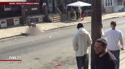 Video Shows Man Beating Woman In The Street As Crowd Looks On