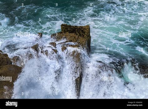 Rough Sea Crashing Onto Rocks On The North Cornwall Coast Stock Photo