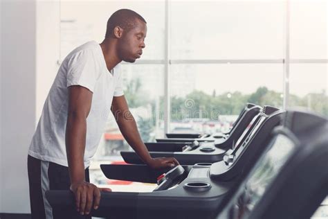 Young Man In Gym Run On Treadmill Stock Image Image Of Gymnasium