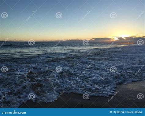 Pacific Ocean Waves At Beach In Kekaha During Sunset On Kauai Island