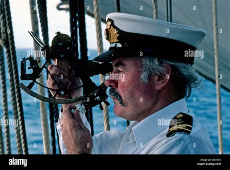 Second Officer Taking A Sight Using A Sextant Aboard Tall Ship Sea