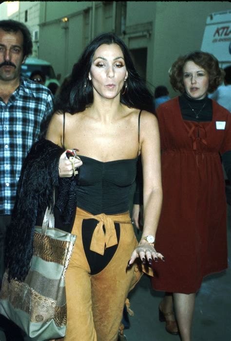 Chers Most Iconic Fashion Moments Over The Last 6 Decades Cher Outfits Cher Looks Fashion Inspo