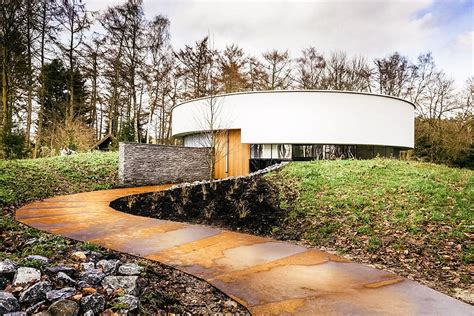 A Circular House Lets Its Residents Engage The Forest Surroundings