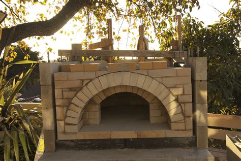 Use spacers to make sure the bricks are evenly placed, we used 1/2 pieces of scrap wood. True Brick Ovens: Build Your Own Brick Oven