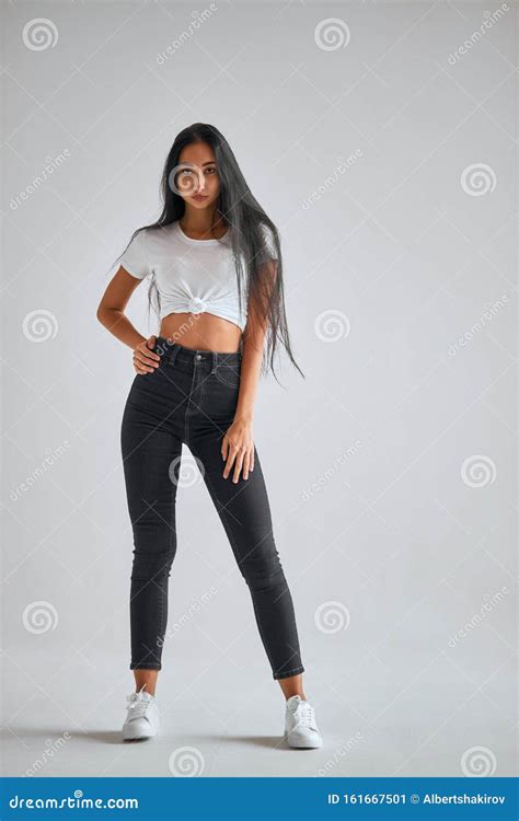 Full Length Portrait Of Long Haired Girl In Studio Stock Image Image