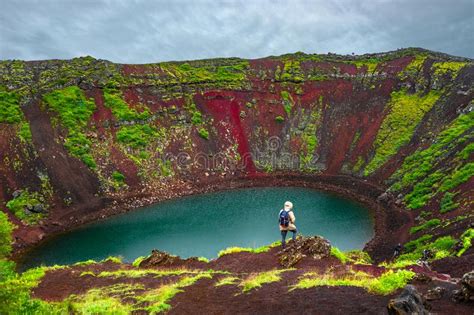 Colorful Volcanic Crater Filled With Blue Water Iceland Stock Photo