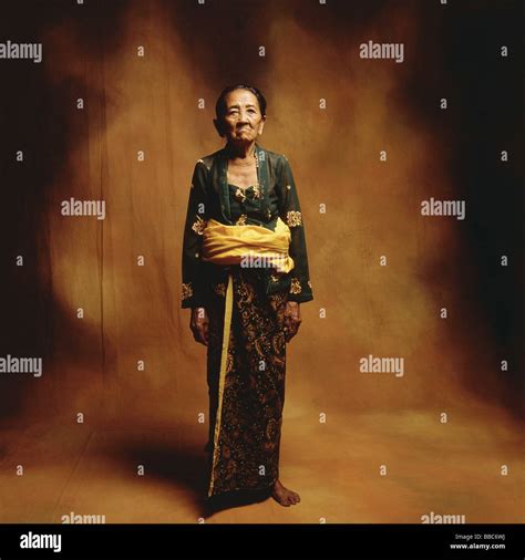 Indonesia Bali Ubud Mature Balinese Woman In Ceremonial Dress Stock