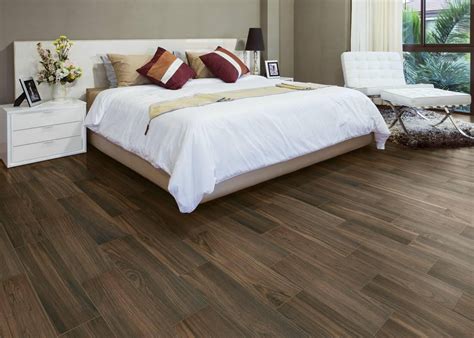 Wood flooring in your master bedroom can add a element of elegance and charm. Wood-Look Tile Bedroom Floor | Why Tile
