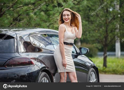 Women Posing On Cars