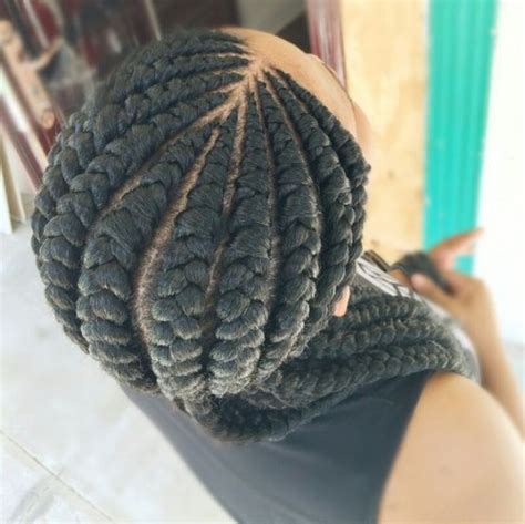 This hairstyle requires continuously adding of hair extension into a single cornrow to get a desired width and length. 50 Ghana Braids Styles | herinterest.com/