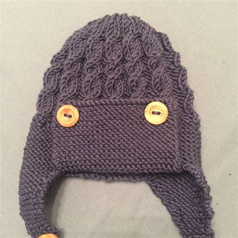 Dayton Cabled Baby Aviator Hat Knitting Pattern By Julie Taylor In