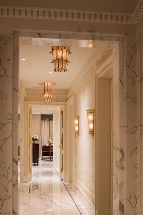 Art Deco Pendant Lighting And Marble Floors Add Elegance To This