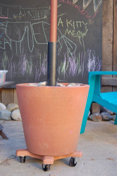 With a table and an umbrella base or with an umbrella stand only. I Made This: Rolling Patio Umbrella Base | Patio umbrella ...