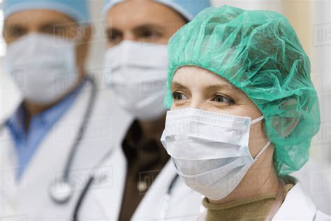 Doctors Wearing Surgical Masks Stock Photo Dissolve