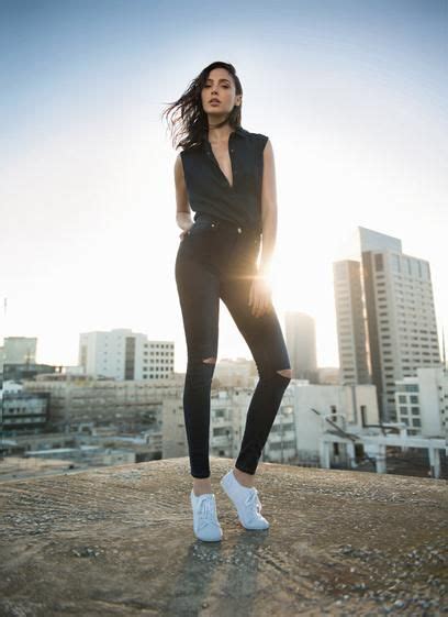 Black Super Skinny Jeans With Ripped Knees And A V Neck Tank Gal Gadot Style Gal Gardot Gal