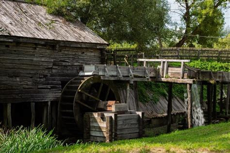 Premium Photo Old Water Mill Made Of Wood With A Wheel Rotating From