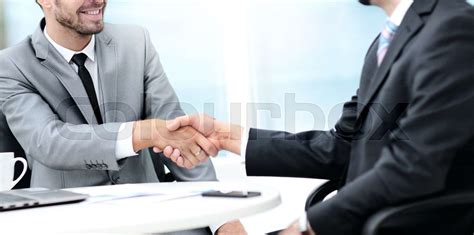 Business Handshake Two Business People Shaking Hands In Office