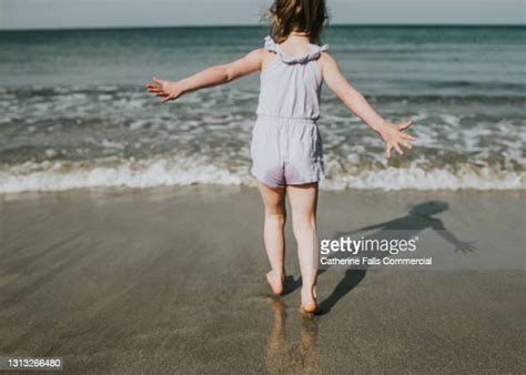 Wet Skin Beach Photos And Premium High Res Pictures Getty Images
