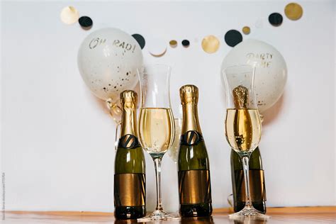 Bottles Of Champagne Glasses With Drink And Party Decor By Stocksy Contributor Beatrix