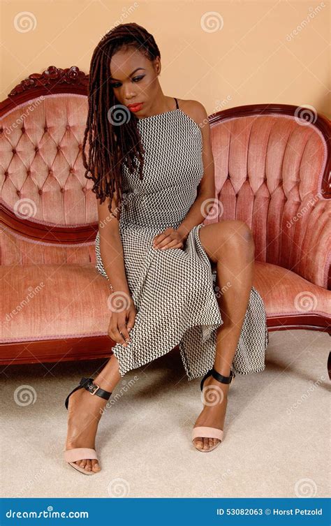 African Woman Sitting On Couch Stock Image Image Of Couch Indoors 53082063