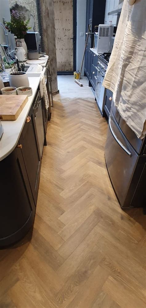 Amtico Spacia Traditional Oak Installation In Herringbone Design