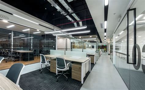 Modern Office Design With Glass Walls And Desks