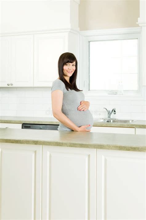 Pregnant Woman In Kitchen Stock Image Image Of Domestic 36977729