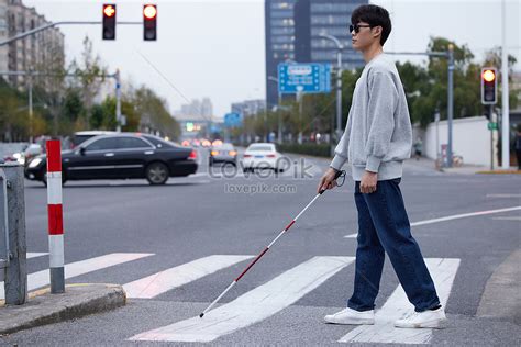 Visually Blind Young People Use Blind Sticks To Explore Crossing The