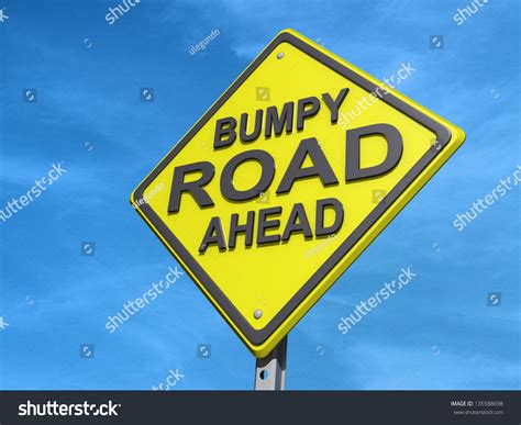 A Yield Road Sign With Bumpy Road Ahead Stock Photo 135588698