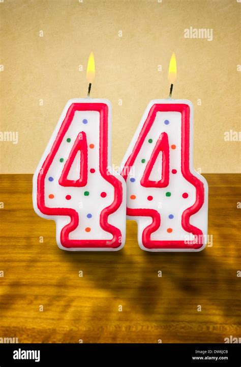 Burning Birthday Candles Number 44 Stock Photo Alamy