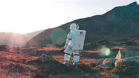 Astronaut Watching Sunrise Stock Video Motion Array