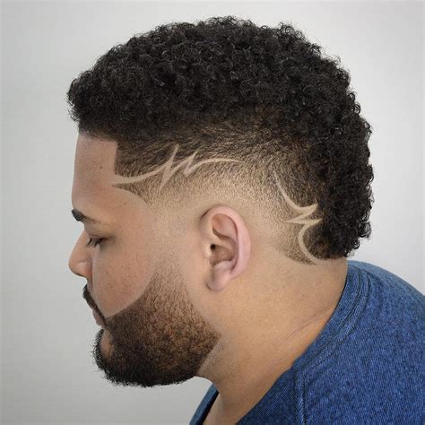 Handsome guy wearing a black shirt. The Best Fade Haircuts For Men (33+ Styles) 2019