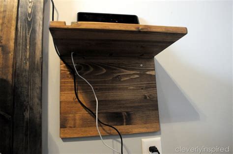 The shelf itself is the wireless charger so you will never have to worry about finding a charging cord. DIY floating shelves with charging stand - Cleverly Inspired