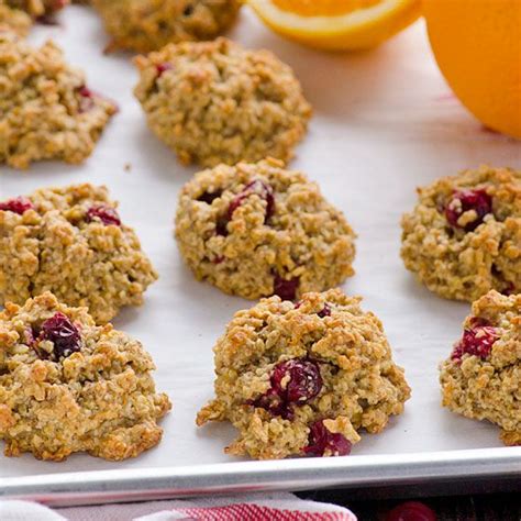 These cookies are a little crunchy on the outside, tender on the inside, and delicious! Cranberry Orange Oatmeal Cookies Recipe with oats, almond meal or flour, coconut oil, honey ...