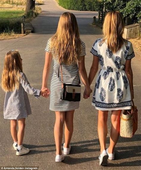 She served as the gossip columnist for the newspaper. Amanda Holden holds hands with her lookalike daughters ...
