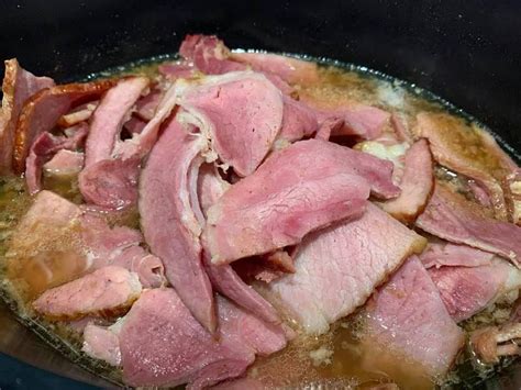 Ham Is Cooking In A Pan On The Stove Top Ready To Be Put Into The Slow Cooker
