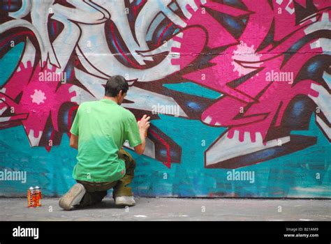 Graffiti Artist At Work Stock Photo Alamy