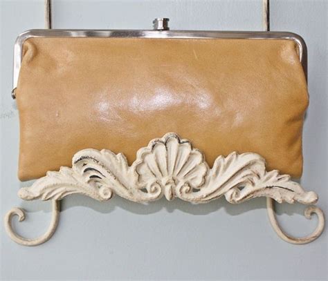 I love my authentic designer purses. Plate rack for displaying your lovely antique and/or ...