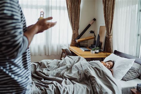 Father Waking Up Sleeping Daughter · Free Stock Photo