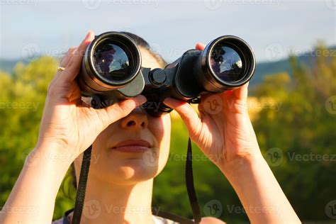Woman With Binoculars 946684 Stock Photo At Vecteezy