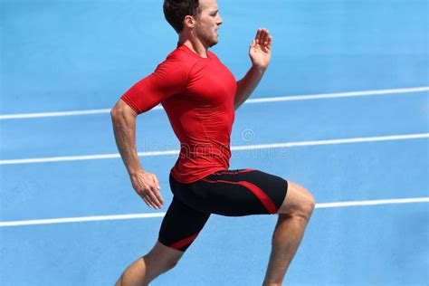 Fitness Exercise Sprint Runner Man Sprinting On Running Track Race