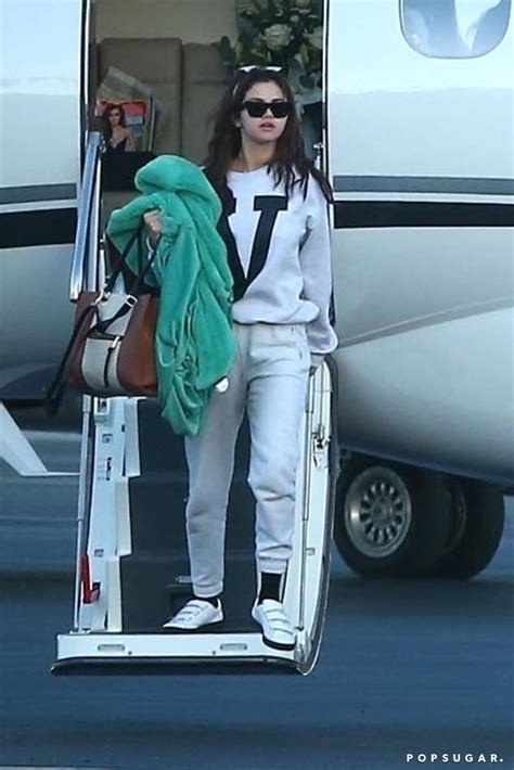 Selena Gomez Wearing Gray Sweatpants On A Plane Popsugar Fashion Photo 2