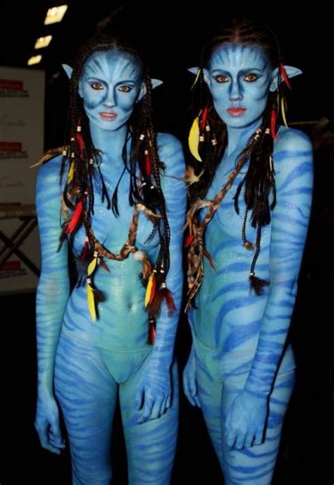 two girls in avatar costumes cosplay
